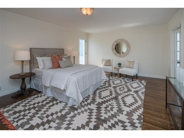 master bedroom features private outdoor space with backyard view