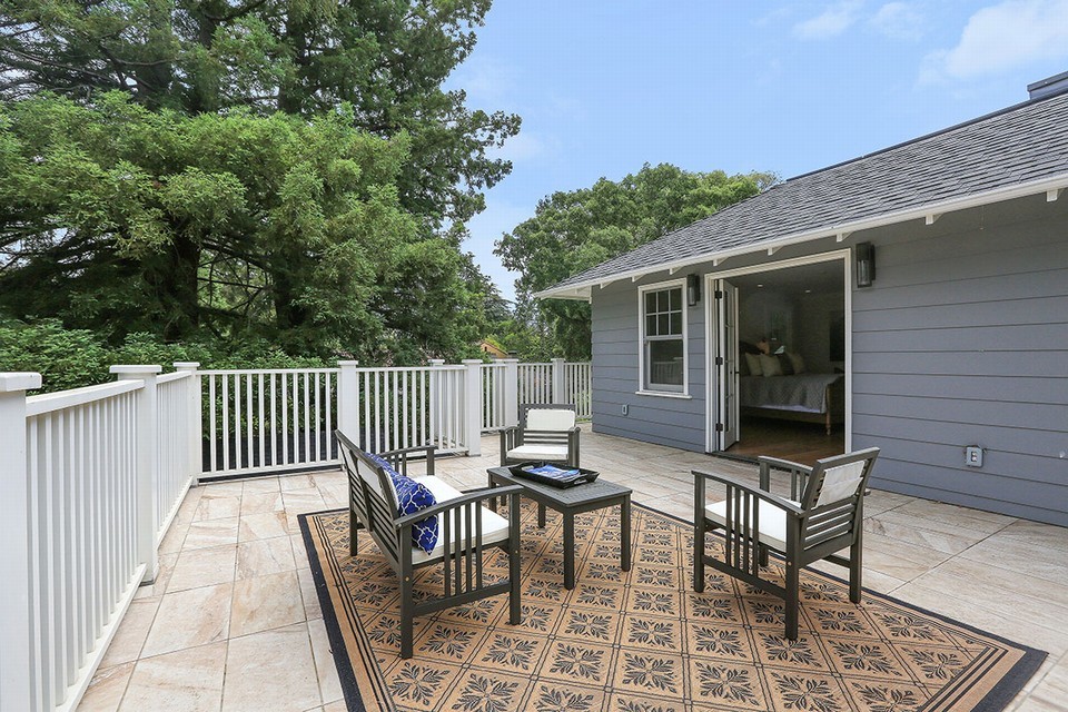 master bedroom includes a large private deck overlooking rear gardens