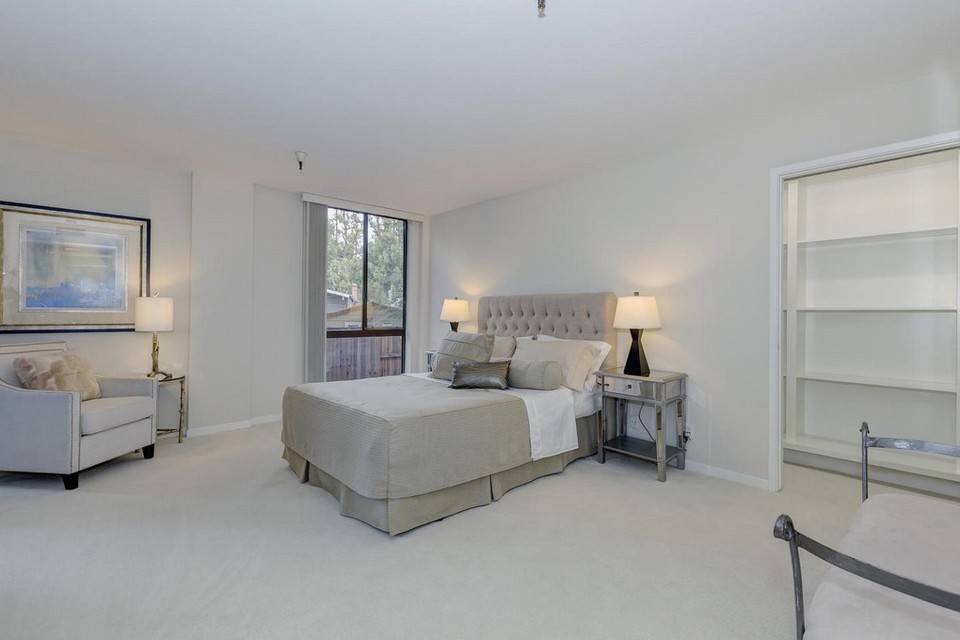master bedroom suite complete with two walk-in closets