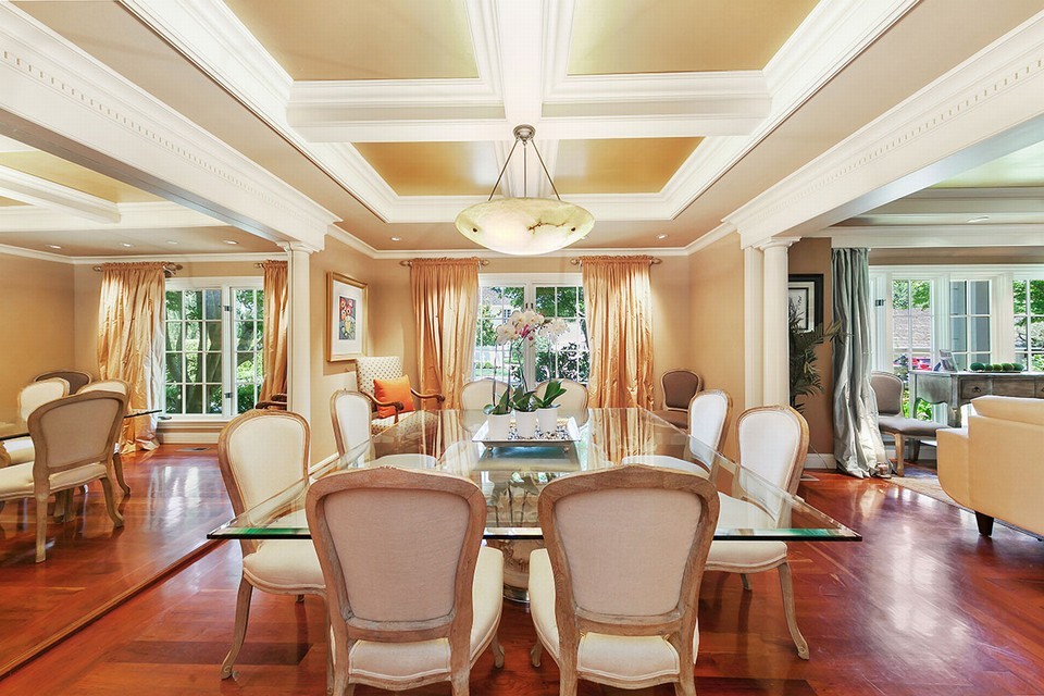 light filled formal dining room with custom cabinetry