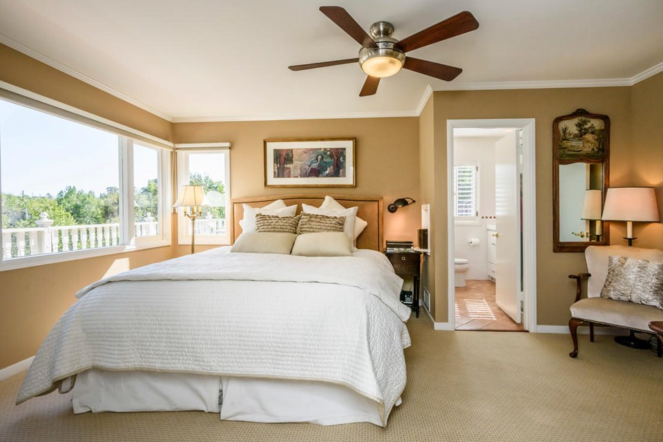 master bedroom suite with private deck