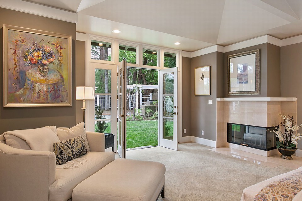 master includes fireplace, his-and-her walk-in closets and french doors to pool and entertainment area