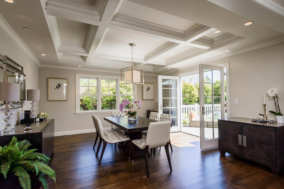 formal dining room with french doors opening out to deck and rear gardens